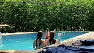 natasha and megan tan while the guy cleans the pool, then swim naked together