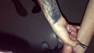 Tattoed Chick Sucking Stranger In Video Booth