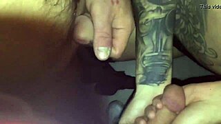 Tattoed Chick Sucking Stranger In Video Booth