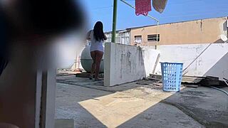 I spy on my busty neighbor while she hangs the clothes