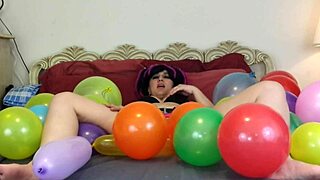 girl indulges in balloon popping fetish masturbation