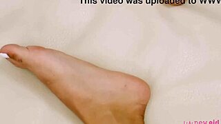 cute brunette shows off her petite body on the sofa