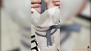 Housewife engages in solo activity with close-ups