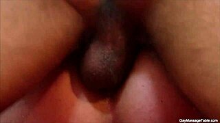 hot twink gets a steamy blowjob on the gay massage table during session