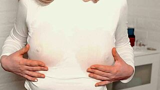 does the young beauty caress wet nipples to orgasm?