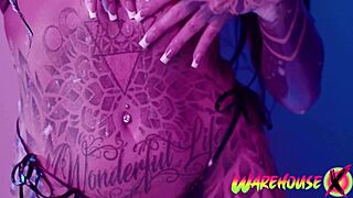 Just watch this inked babe finger her tight pussy in the bathtub.