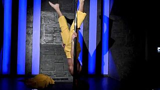 watch this hot young guy strip and dance acrobatically on the pole, tearing clothes off