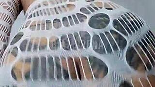 Tattooed brunette dancing funk in Brazilian style.