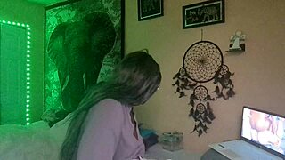 Naejae masturbates watching lesbian porn