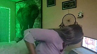 Naejae masturbates watching lesbian porn