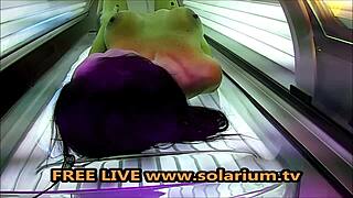 Solarium horny milf with big breasts masturbates under the solarium