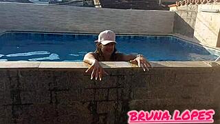 Hey, check out Bruna’s pink bikini buried in her hot ass while cleaning the pool in a see-through white top—comment the next bikini color you want!