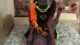 Spiderman feels intense passion with the biker in spandex.