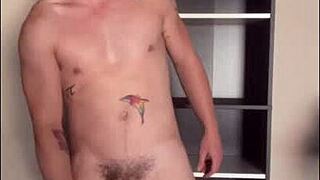 Hey, watch this twink jerking off his big cock in the sunlight