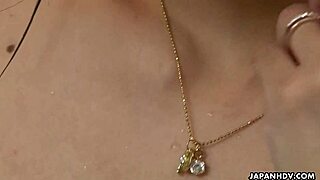 Look at this naked Asian brunette babe working her long fingers deep