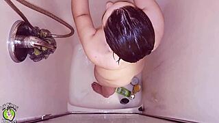 Man spies on BBW teen fingering with dildo in shower on hidden cam