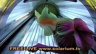 i caught this blonde teen fingering herself in public solarium on hidden cam