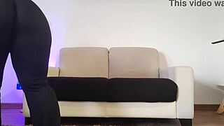 Curvy amateur in leggings cleans her apartment