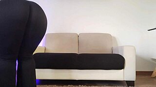 Curvy amateur in leggings cleans her apartment