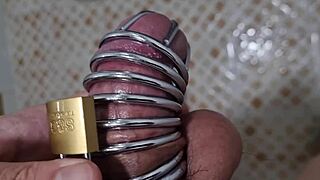 korslaveman struggles to pee while locked in chastity belt