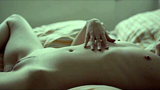 Hey, join this Czech babe in bed for a wild masturbation session with her huge tits