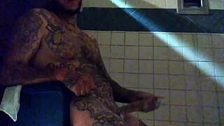 just stroking this big tattooed white dick in the shower for fun.