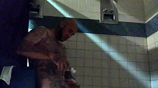 just stroking this big tattooed white dick in the shower for fun.