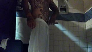 just stroking this big tattooed white dick in the shower for fun.