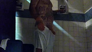 just stroking this big tattooed white dick in the shower for fun.