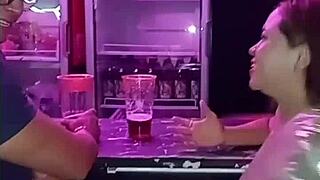 Horny brunette in costume gets spit on and banged in men's bathroom.