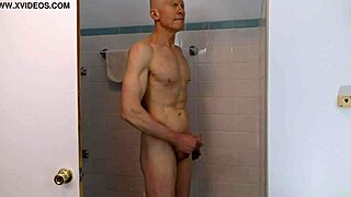 Horny gay nudist strokes himself off in steamy shower