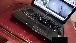 Alone at home, she indulges in porn and self-pleasure with fingering