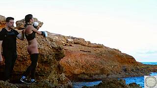 Boxer bound and spanked before rimming her dom by the Balearic Sea. A warrior-themed domination session begins with raw intensity