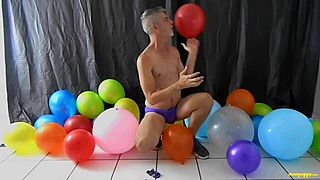 yo, check richard lennox, this horny gay dilf, playing with balloons! 🎈