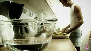 A blonde bimbo plays with cream and her mans dick in the kitchen until cumshot