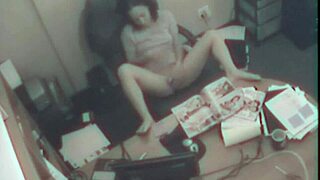 Office blonde secretly fingers pussy during work hours.