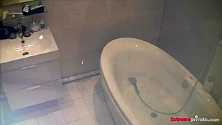 Are you watching Scarlett play with toys in the bath?