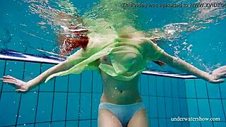 Nina Mohnatka shows off hairy pussy while bathing in tight underwater shots.