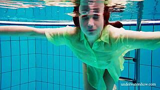 Nina Mohnatka shows off hairy pussy while bathing in tight underwater shots.