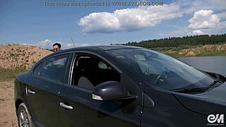 Naked men wash car outdoors