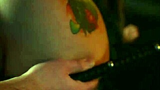 Tattoo girl participates in bdsm session in studio