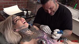 sascha plays with amber luke while she gets tattooed