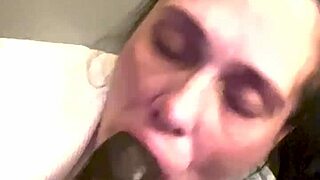 Curious how deep she slurps on that big black cock?