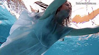 Andrejka amazes with underwater moves. This Czech brunette shines in bikini at the pool.