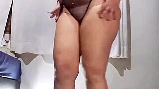 Dirty whore smokes while undressing