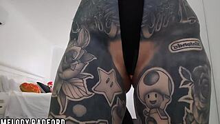 A beautiful milf tries on a bikini, spreading her legs to show off the led butt plug teasingly.