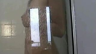 japanese babe with natural tits fingering her pussy in shower