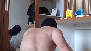 sexy gay in red mask plays with anal dildo toy