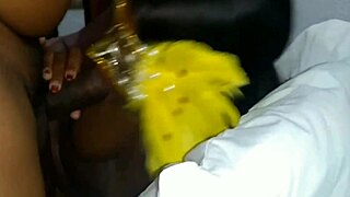 The black woman enjoys pounding in the kitchen.