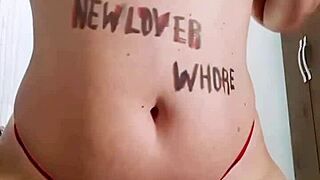 this naughty slut smokes while undressing for fun